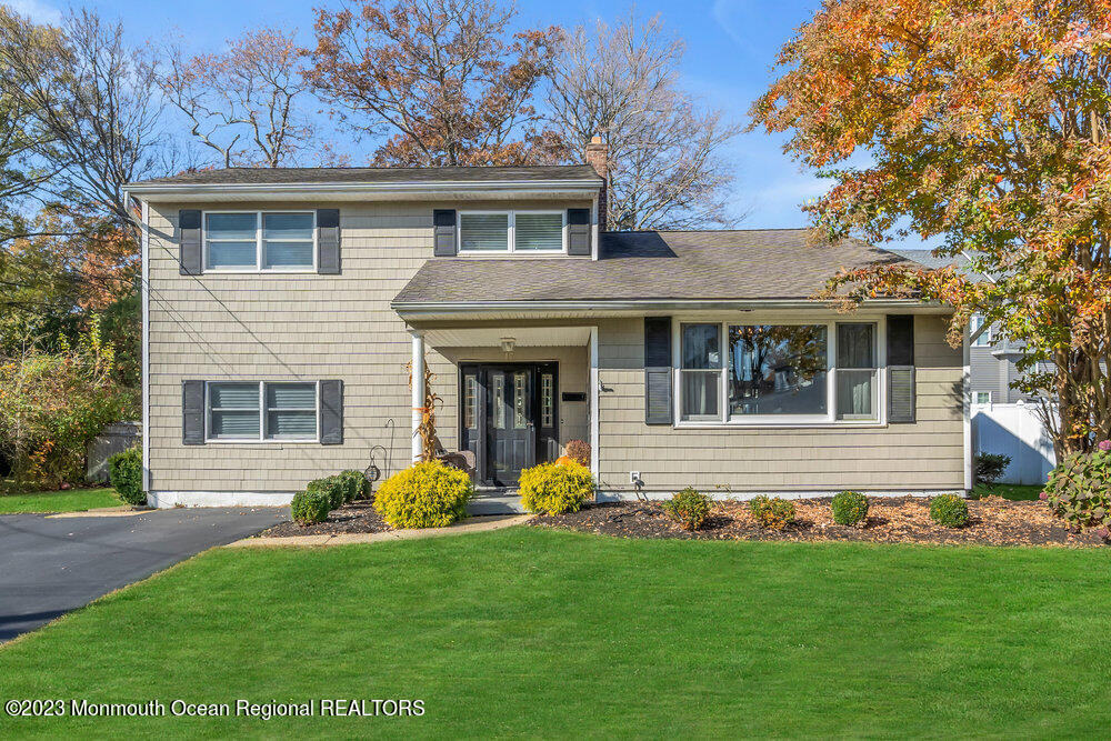 17 Eisele Avenue Asbury Park, NJ 07712 - Photo 51 of 52 a front view of house with yard and green space