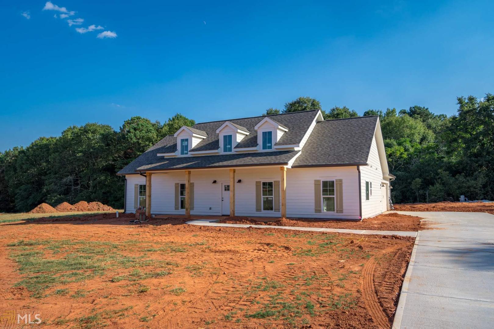 3280 Davis Academy Road, Unit TRACT 3 Rutledge, GA 30663 - Photo 1 of 1 a front view of a house with a yard