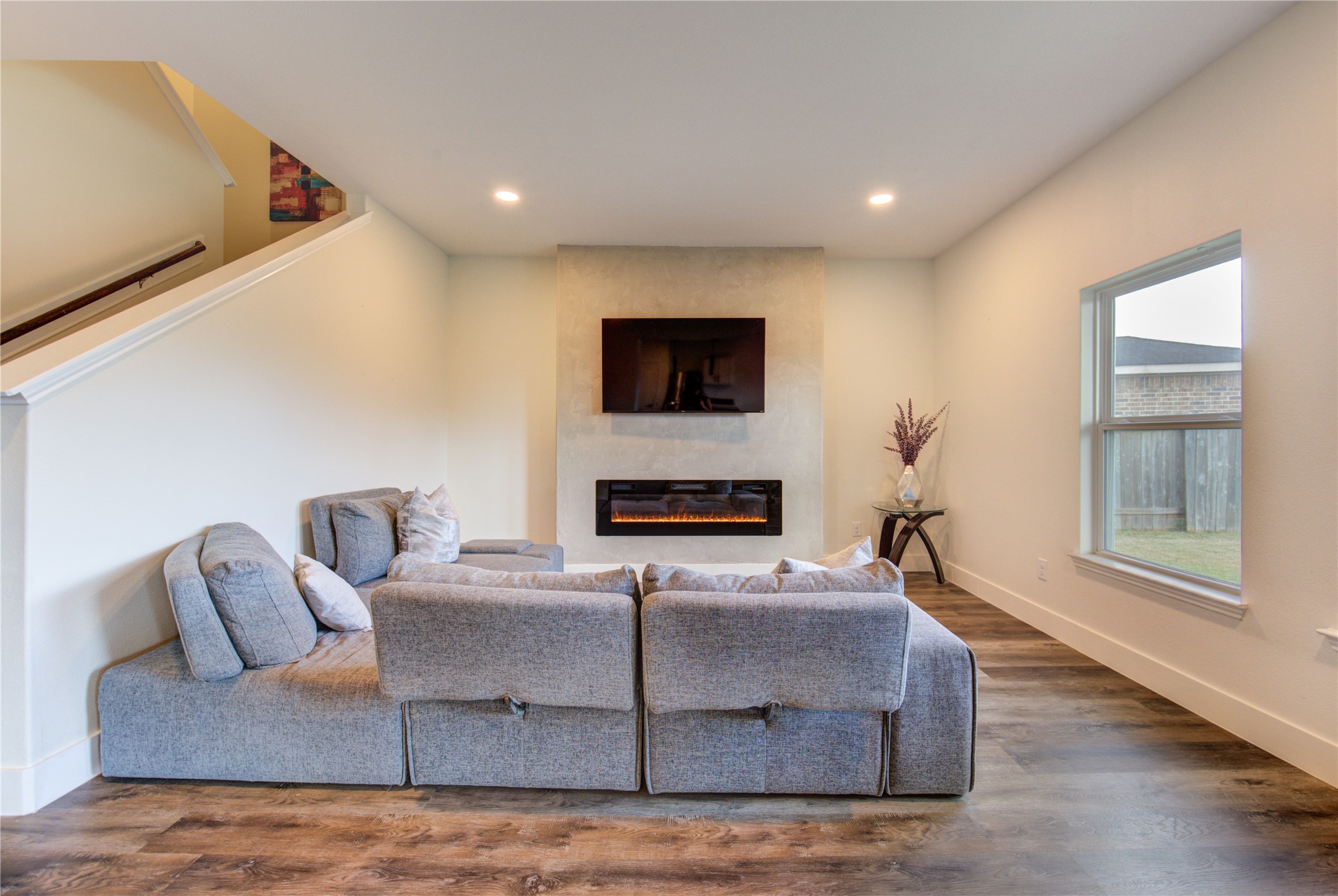 2003 Beach Bluff Road Rosenberg, TX 77469 - Photo 14 of 50 a living room with furniture fireplace and flat screen tv