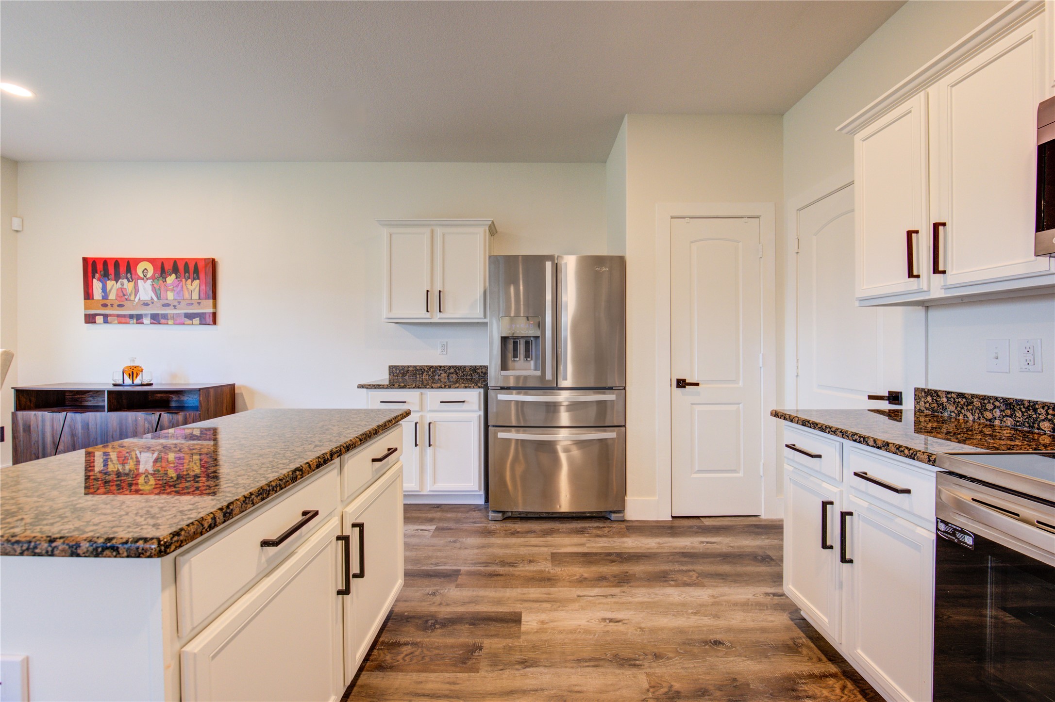 2003 Beach Bluff Road Rosenberg, TX 77469 - Photo 25 of 50 a kitchen with stainless steel appliances granite countertop a sink stove and refrigerator