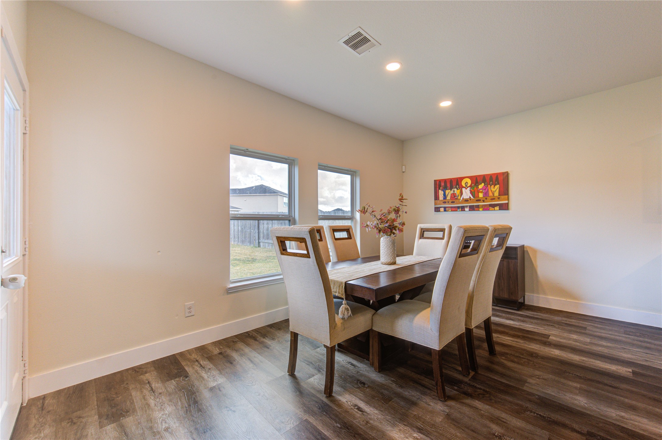 2003 Beach Bluff Road Rosenberg, TX 77469 - Photo 29 of 50 a view of a dining room with furniture and wooden floor