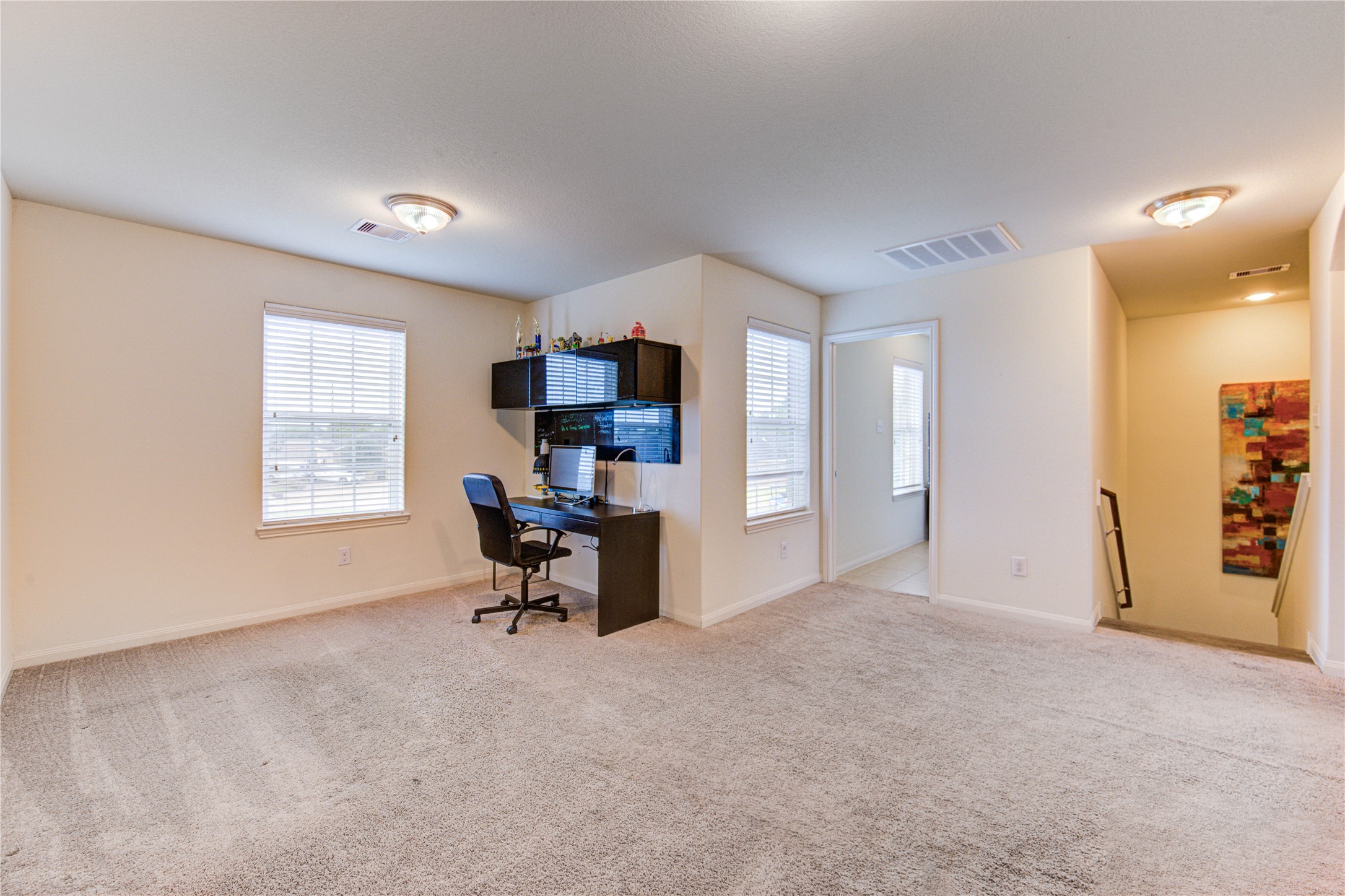 2003 Beach Bluff Road Rosenberg, TX 77469 - Photo 31 of 50 a view of a livingroom with workspace and a window