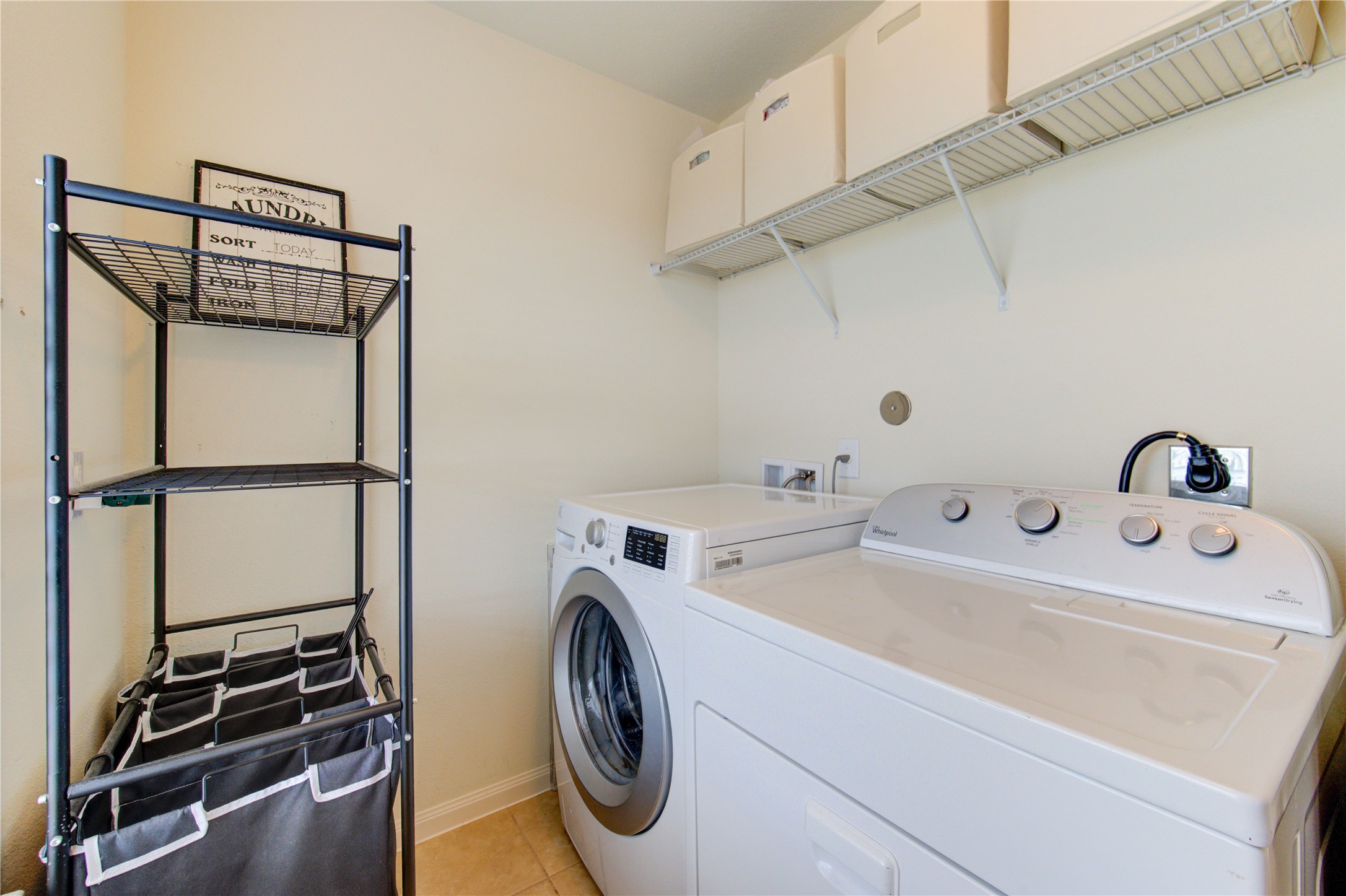 2003 Beach Bluff Road Rosenberg, TX 77469 - Photo 33 of 50 a utility room with dryer and washer