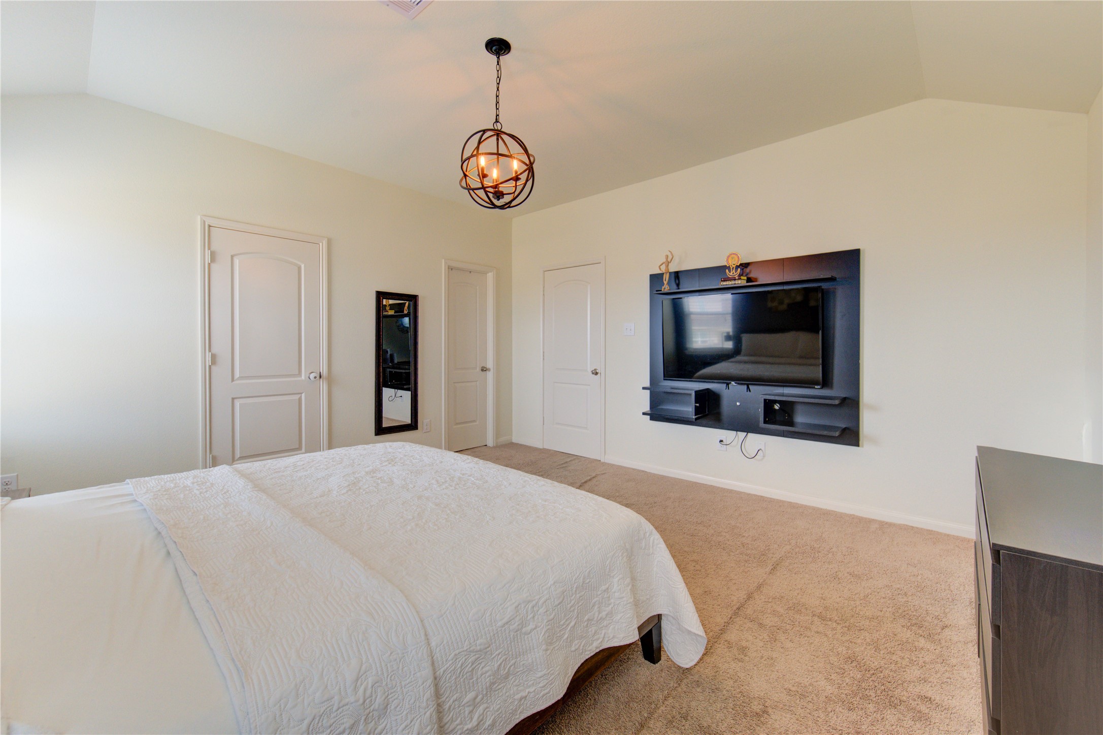 2003 Beach Bluff Road Rosenberg, TX 77469 - Photo 35 of 50 a bedroom with a bed and a flat screen tv