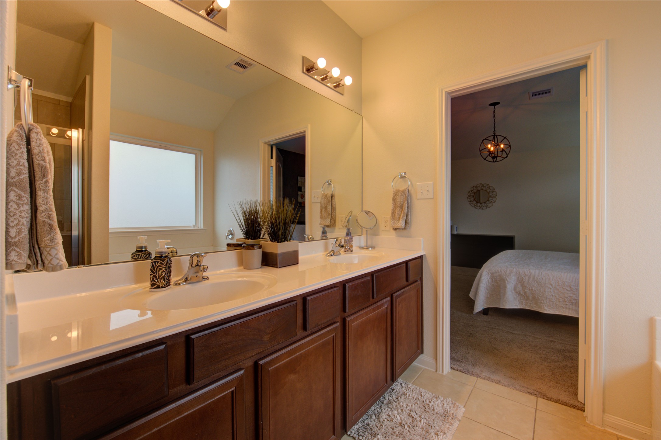 2003 Beach Bluff Road Rosenberg, TX 77469 - Photo 40 of 50 a en suite bathroom with a double vanity sink and mirror