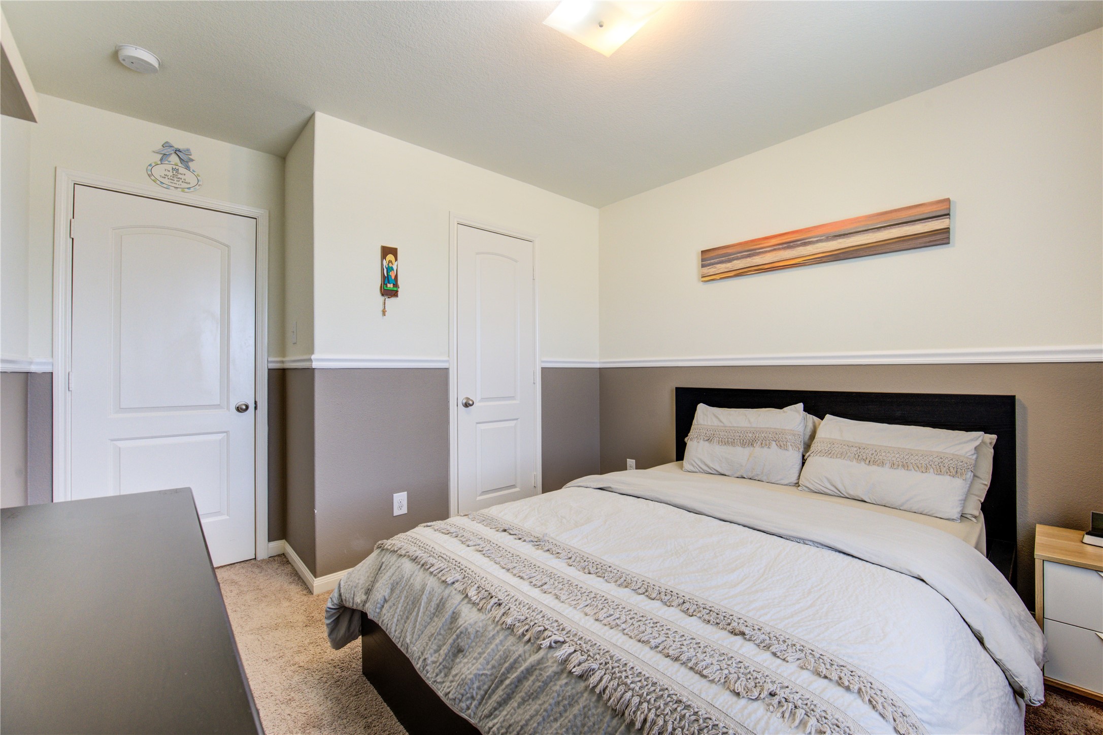 2003 Beach Bluff Road Rosenberg, TX 77469 - Photo 43 of 50 a bedroom with a bed and cabinets