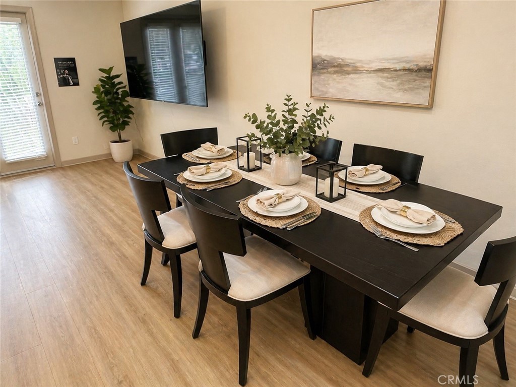 203 North San Dimas Canyon Road San Dimas, CA 91773 - Photo 11 of 11 a view of a dining room with furniture window and wooden floor