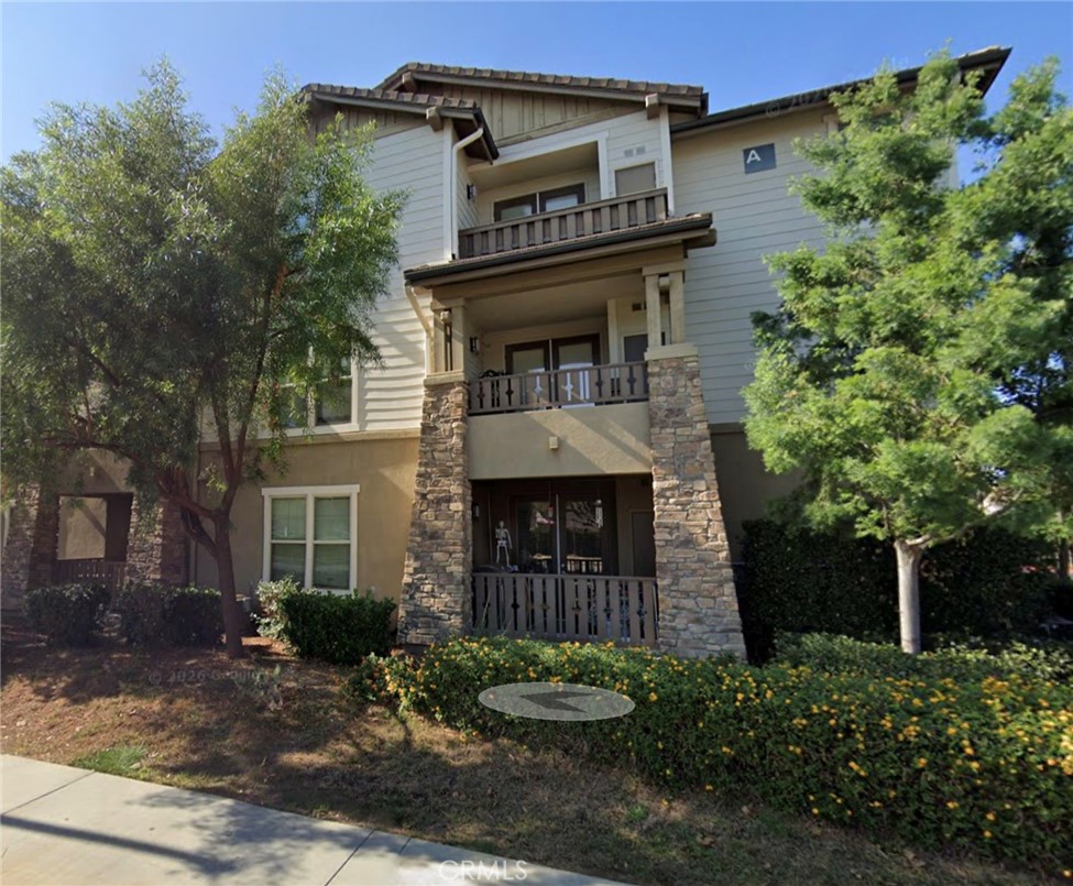 203 North San Dimas Canyon Road San Dimas, CA 91773 - Photo 2 of 11 a front view of a house with garden