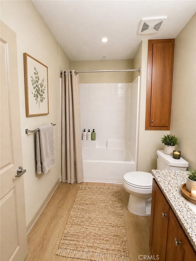 203 North San Dimas Canyon Road San Dimas, CA 91773 - Photo 7 of 11 a bathroom with a granite countertop sink a toilet and shower
