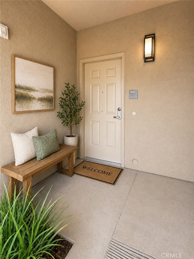 203 North San Dimas Canyon Road San Dimas, CA 91773 - Photo 8 of 11 a living room with furniture and a potted plant