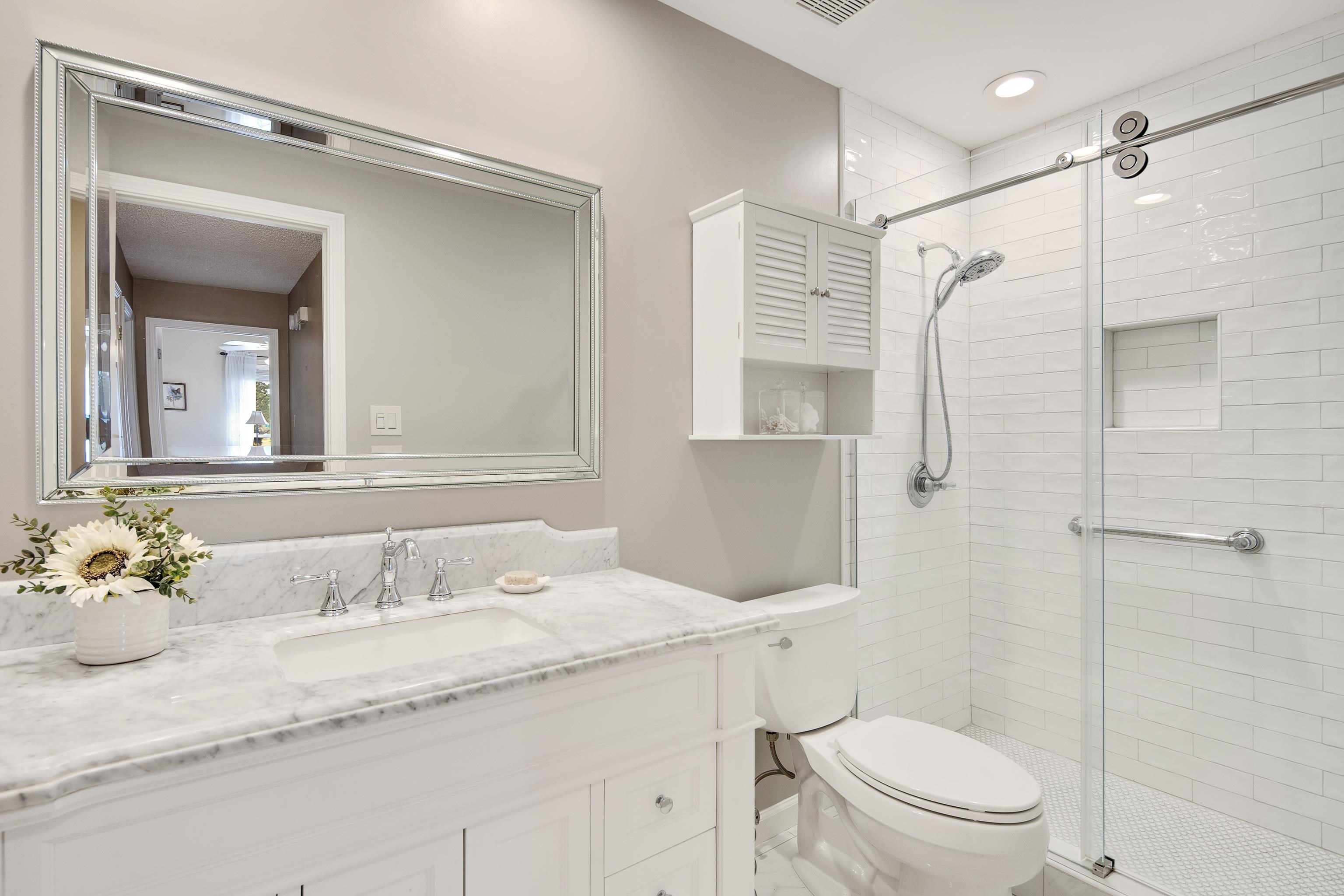 1524 Dexter Run Circle East Memphis, TN 38016 - Photo 27 of 35 Bathroom with vanity, toilet, and an enclosed shower