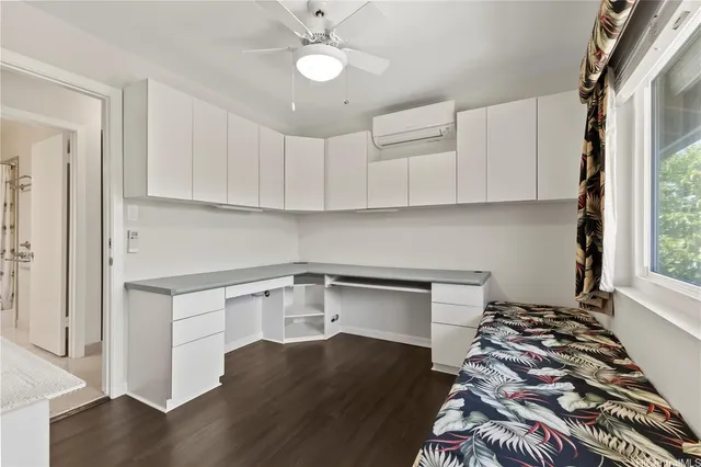 a kitchen with a stove and a refrigerator