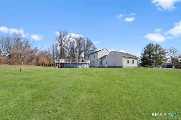 a view of a house with a big yard