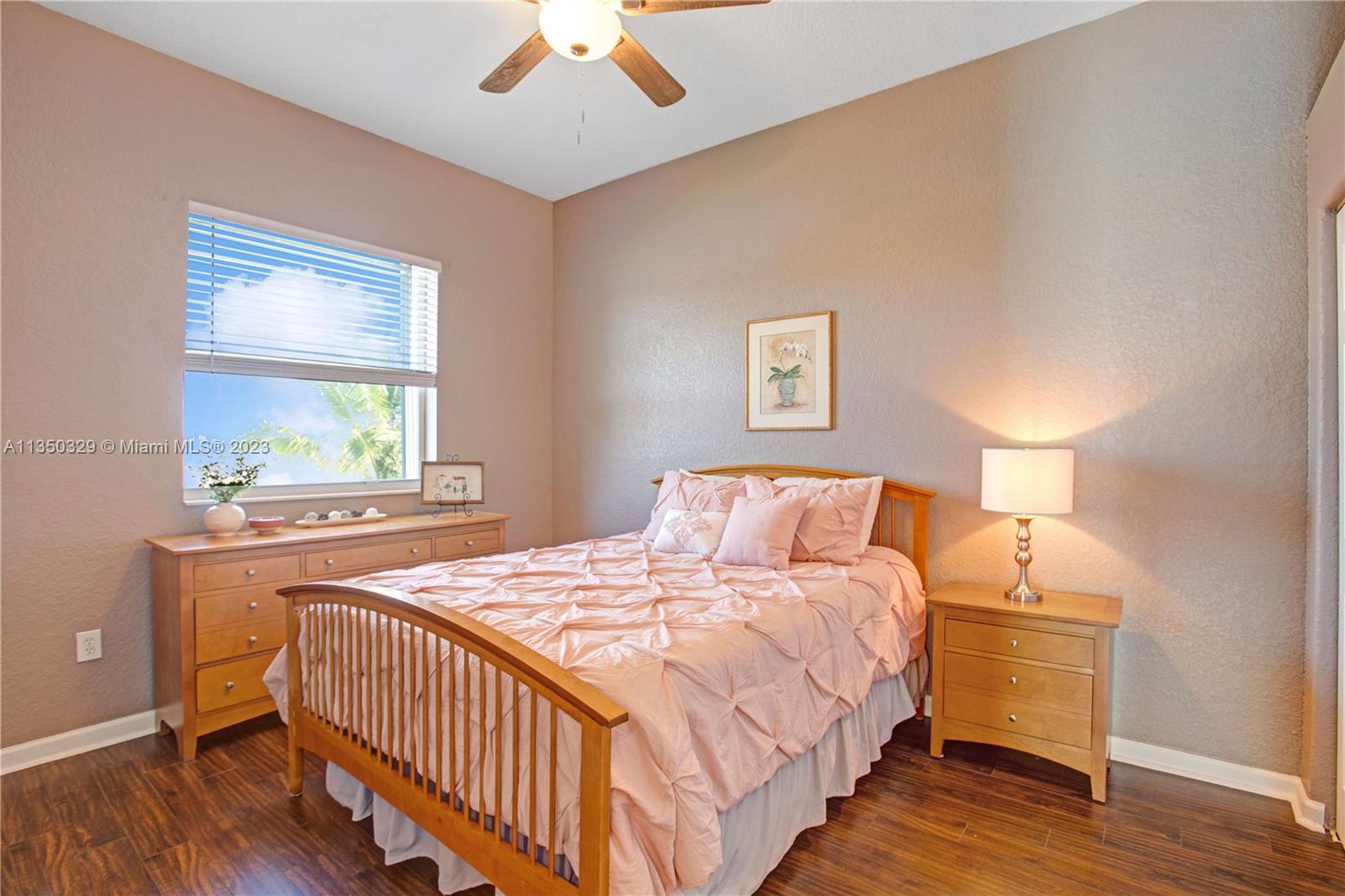 3060 Southwest 195th Terrace Miramar, FL 33029 - Photo 43 of 76 a bedroom with a bed and a window