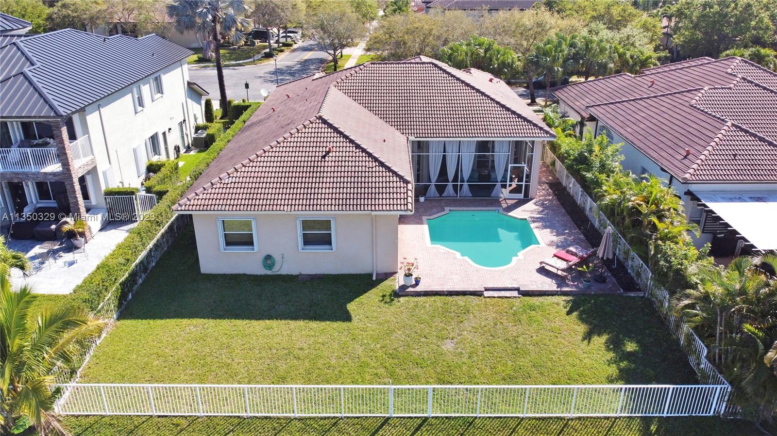 3060 Southwest 195th Terrace Miramar, FL 33029 - Photo 5 of 76 a view of a house with a swimming pool