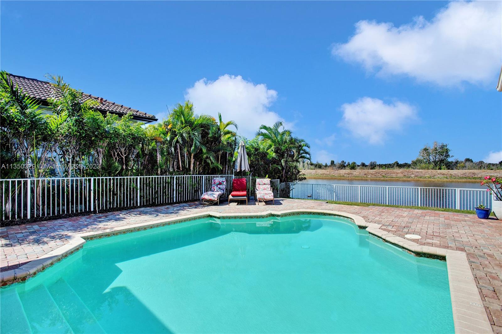 3060 Southwest 195th Terrace Miramar, FL 33029 - Photo 53 of 76 a view of a backyard with sitting area