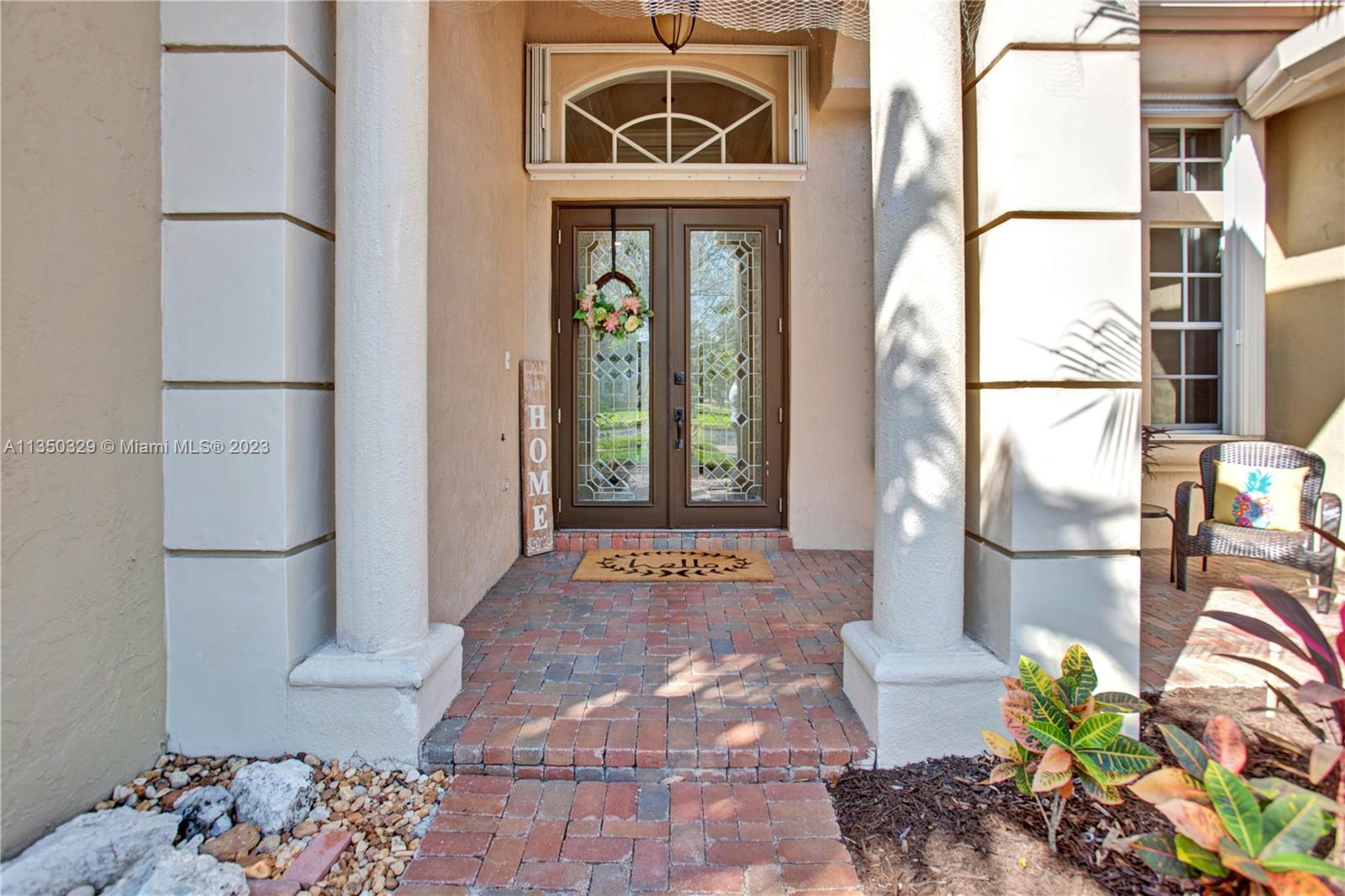 3060 Southwest 195th Terrace Miramar, FL 33029 - Photo 6 of 76 a front view of a house with outdoor space