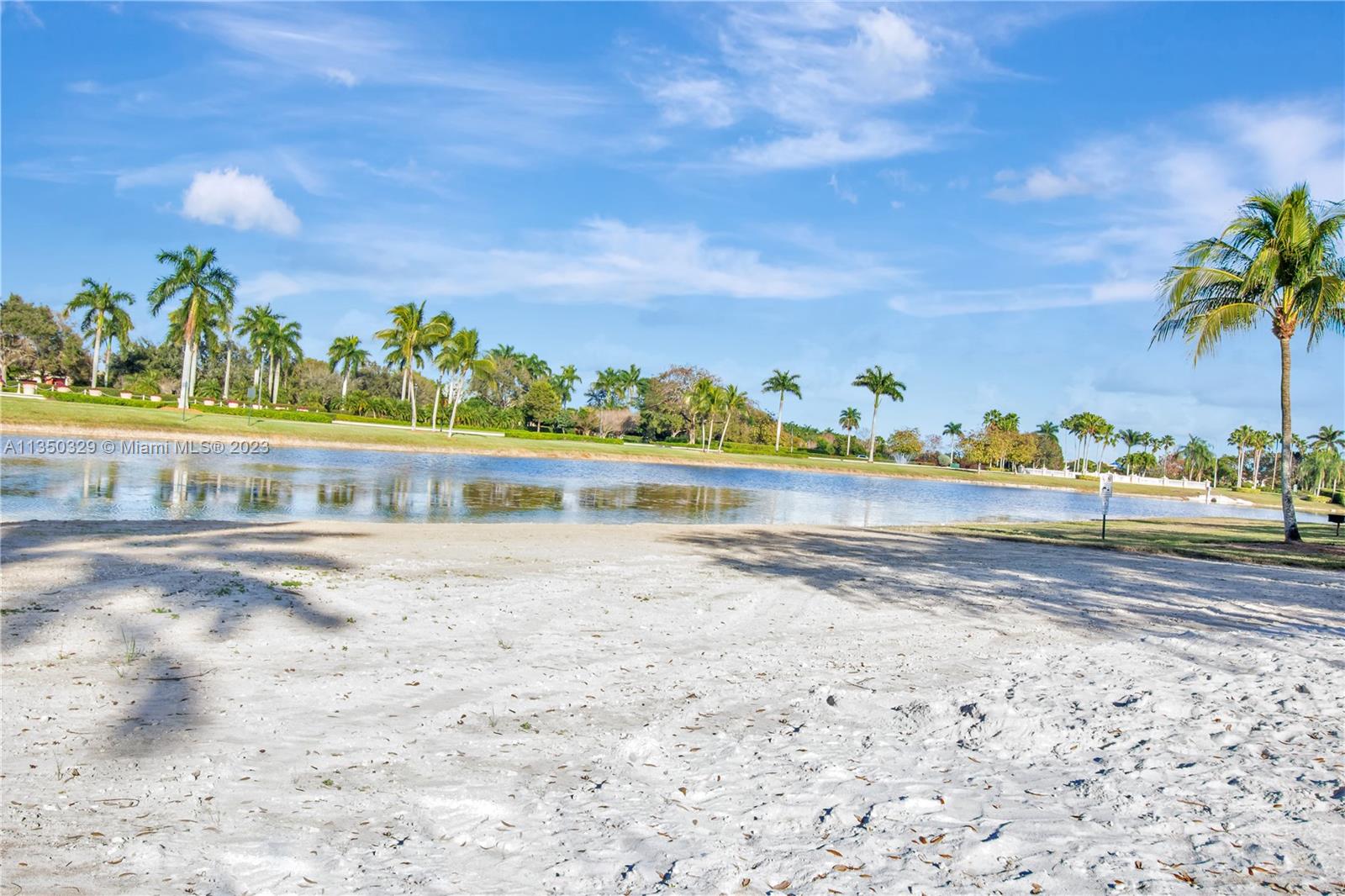 3060 Southwest 195th Terrace Miramar, FL 33029 - Photo 67 of 76 a view of a lake with a beach