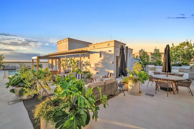 a blue chair sitting in front of a building