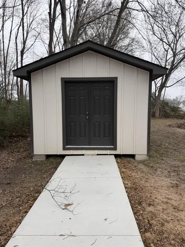 a white house with a outdoor space