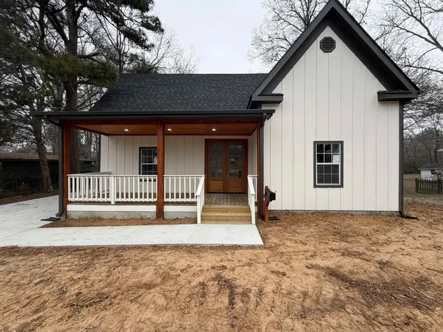 a front view of a house with a garage