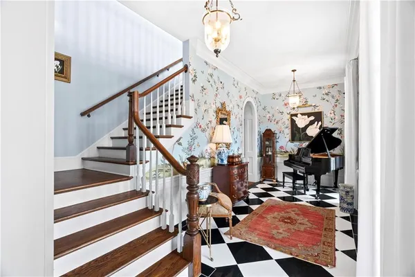 a bathroom with a sink a mirror and a bathtub