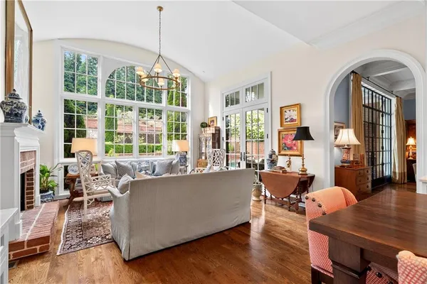 a living room with furniture and a table