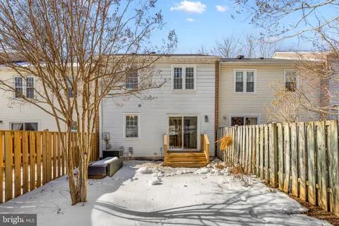 a view of outdoor space with deck and trees