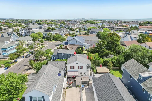 an aerial view of a house with a outdoor space