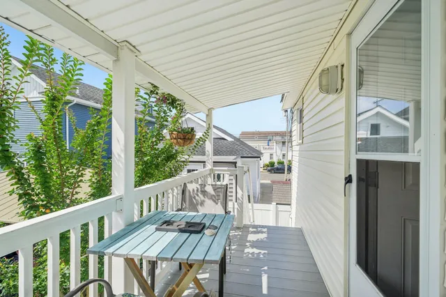a dinning table and chairs in the terrace