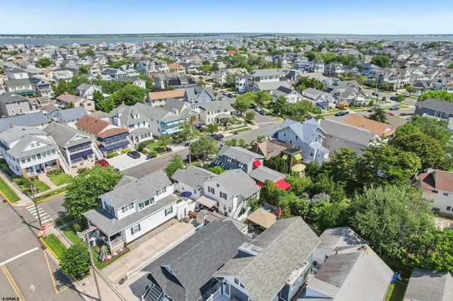 an aerial view of a city with lots of residential buildings