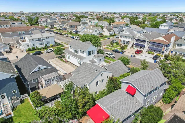 an aerial view of a city with lots of residential buildings