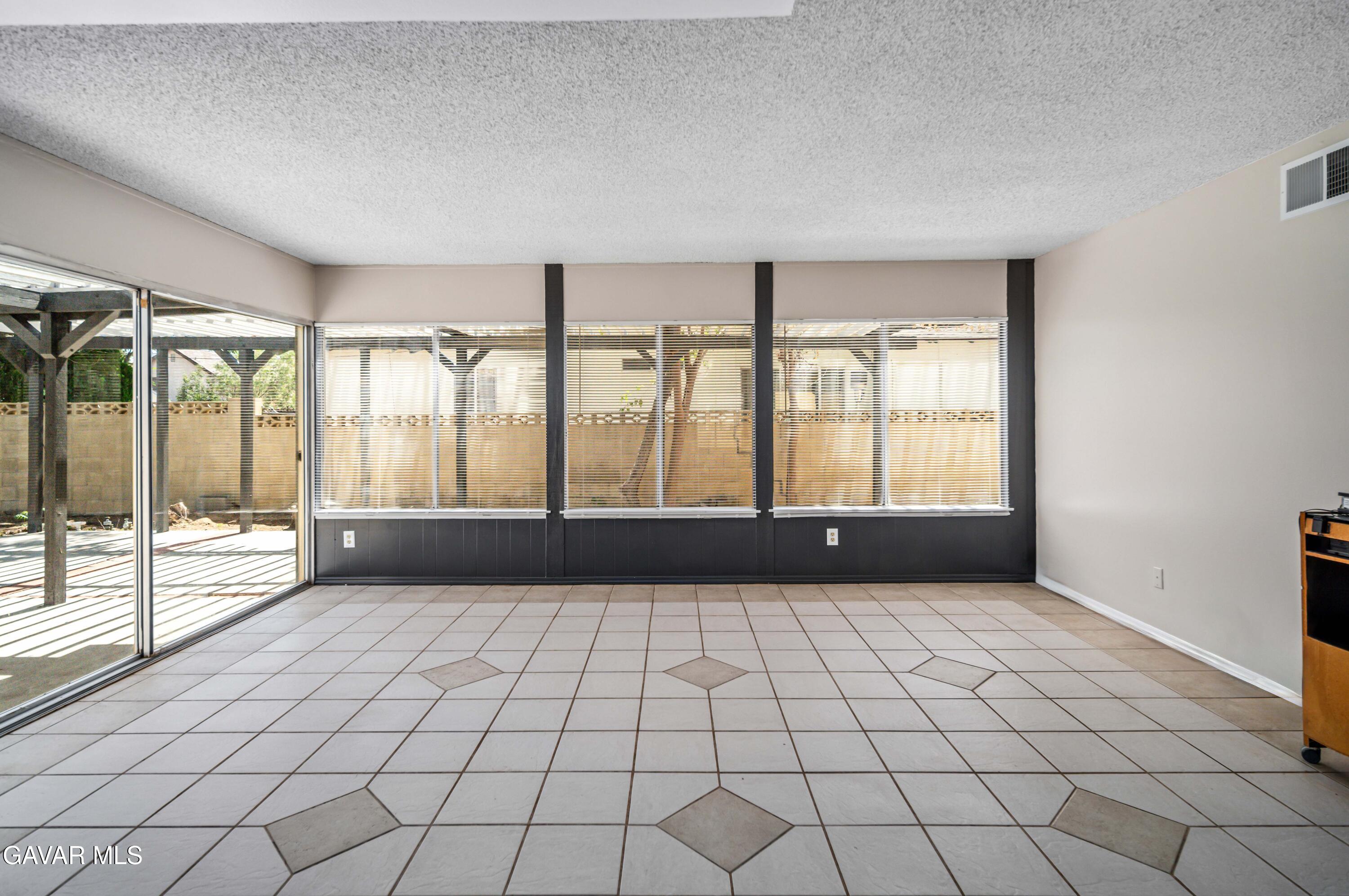 1027 Caperton Street Lancaster, CA 93535 - Photo 13 of 30 a view of an empty room and window