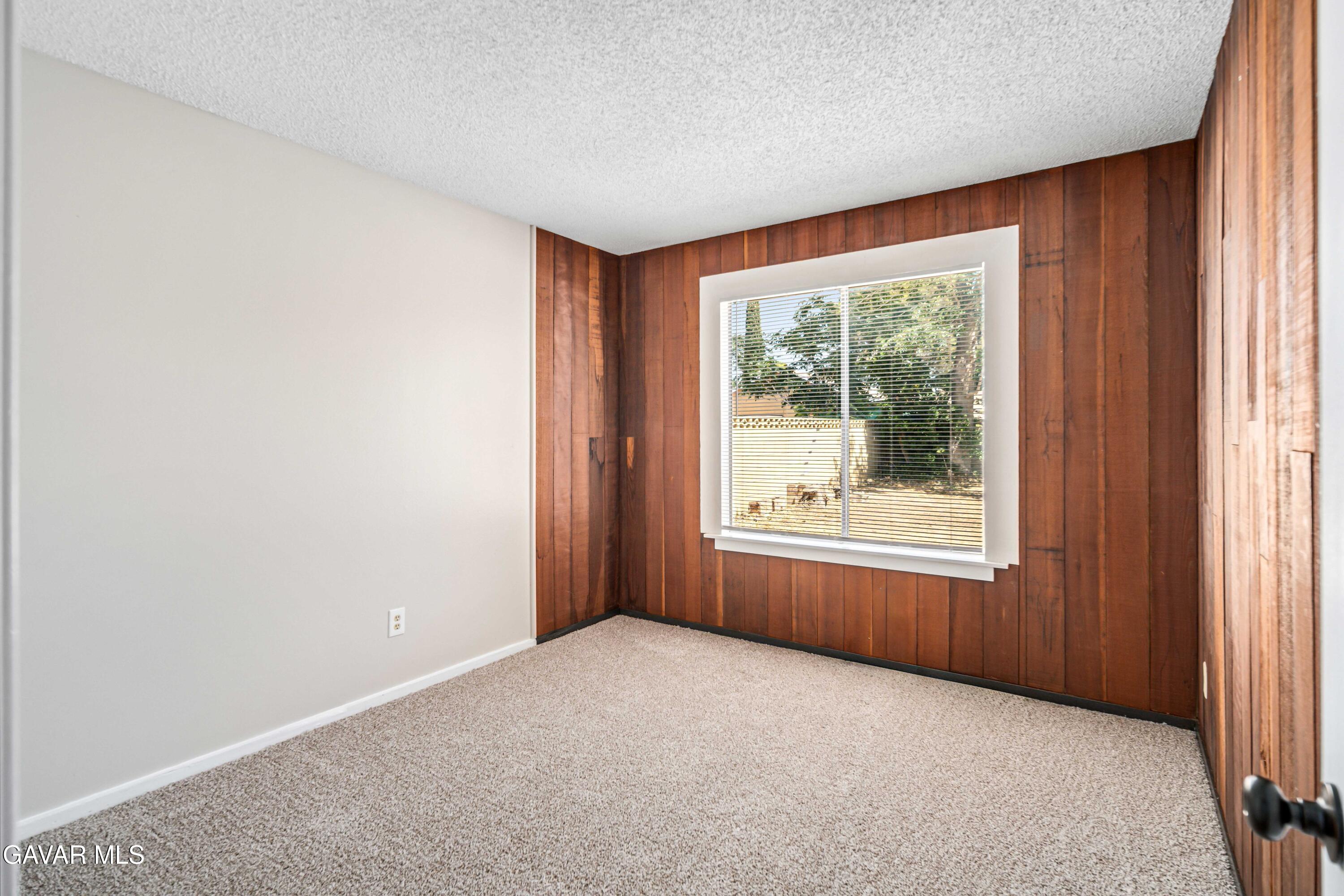 1027 Caperton Street Lancaster, CA 93535 - Photo 21 of 30 an empty room with windows