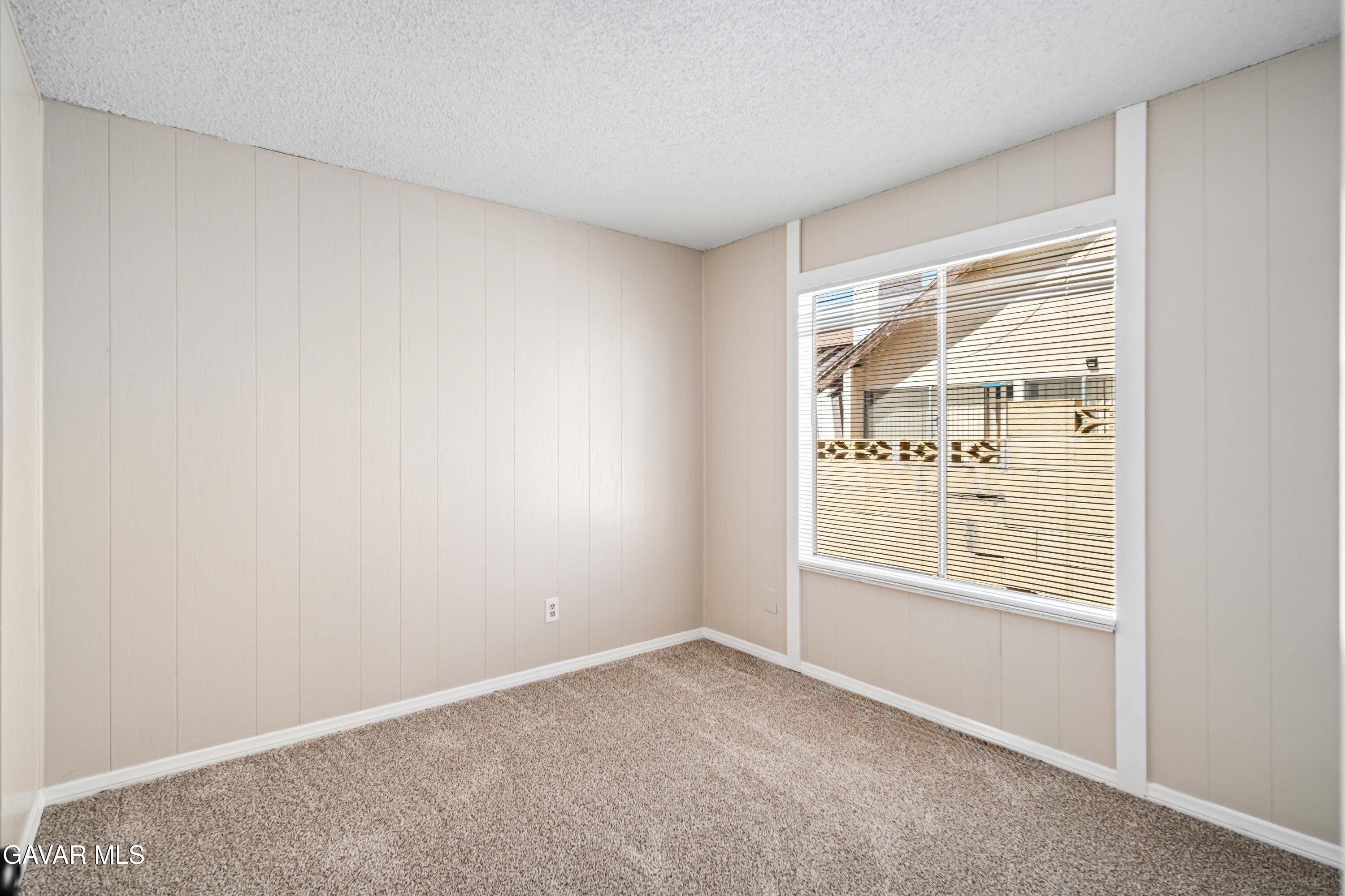 1027 Caperton Street Lancaster, CA 93535 - Photo 23 of 30 a view of an empty room with a window