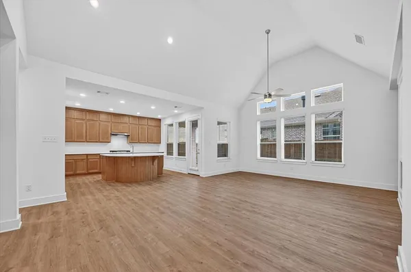 a view of kitchen with wooden floor