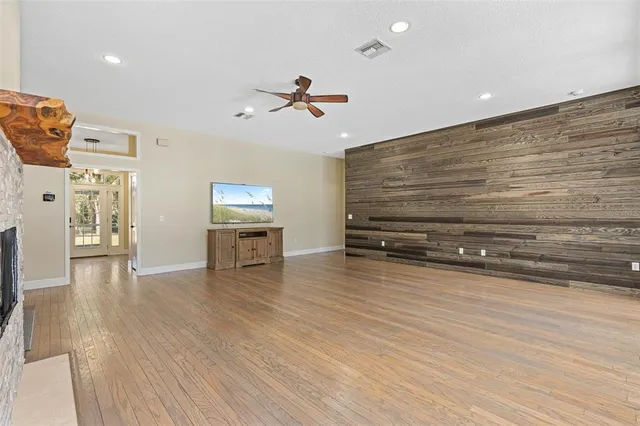 a view of backyard with sitting area