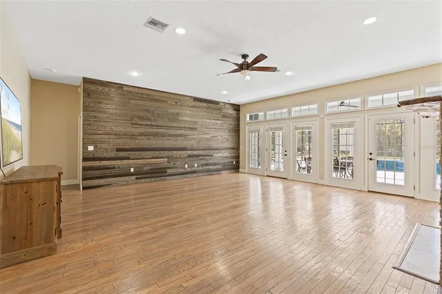 a kitchen with stainless steel appliances a refrigerator sink and cabinets