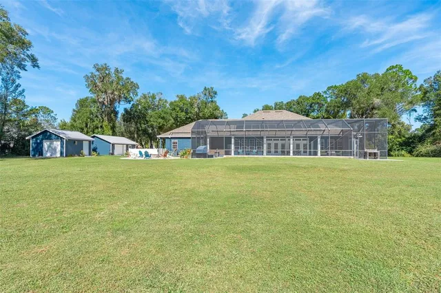 a view of a garden and lake
