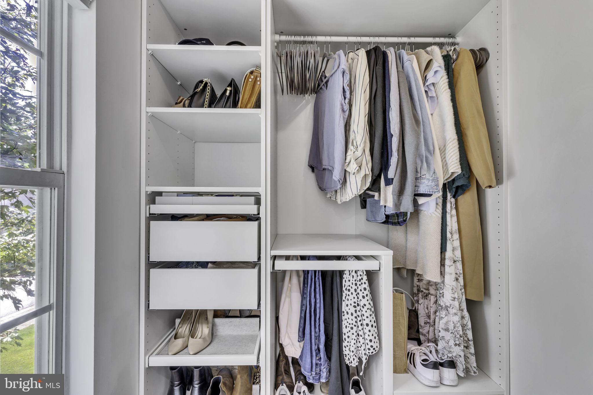 6546 Cornell Road Bryans Road, MD 20616 - Photo 21 of 35 a view of walk in closet with clothes and shoes