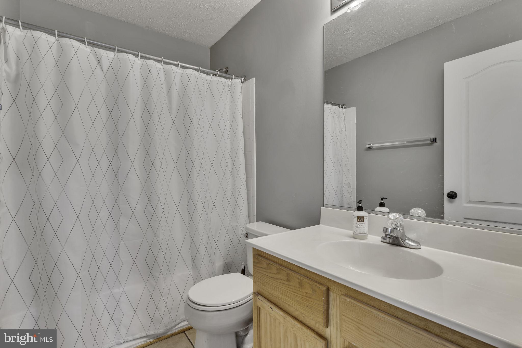 6546 Cornell Road Bryans Road, MD 20616 - Photo 22 of 35 a bathroom with a sink and a toilet