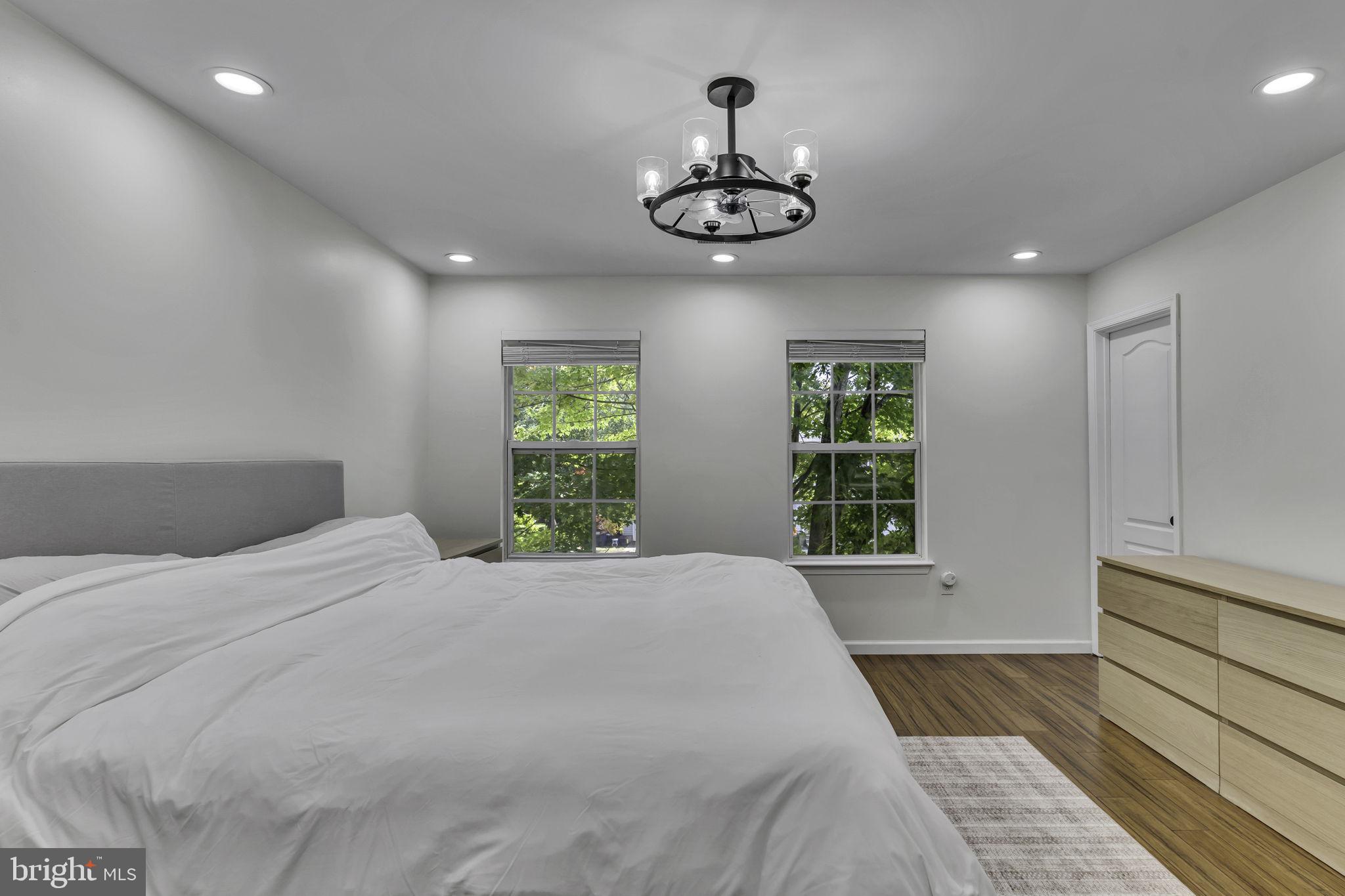 6546 Cornell Road Bryans Road, MD 20616 - Photo 25 of 35 a bedroom with a large bed and a window