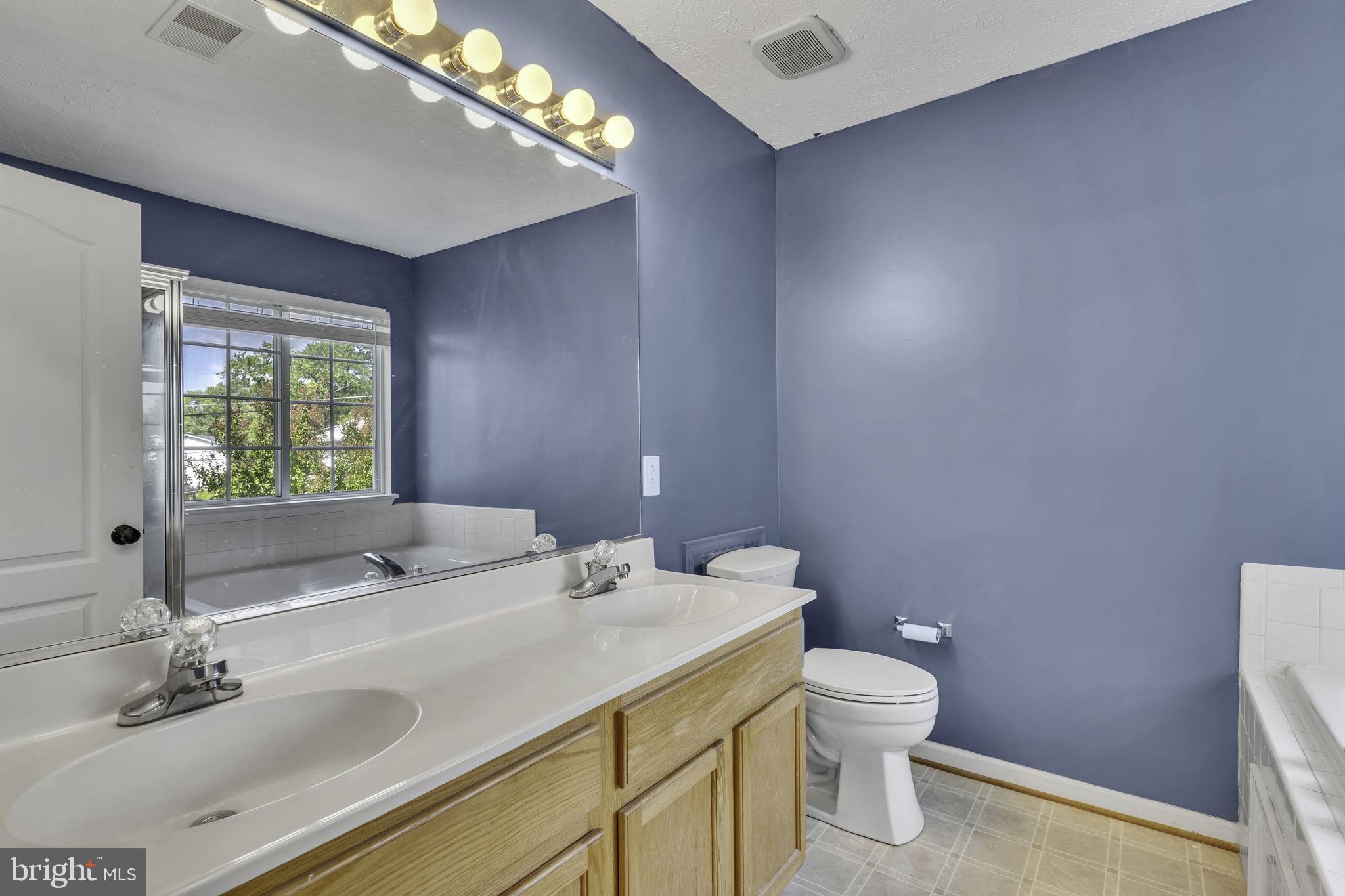 6546 Cornell Road Bryans Road, MD 20616 - Photo 26 of 35 a bathroom with a sink and a toilet