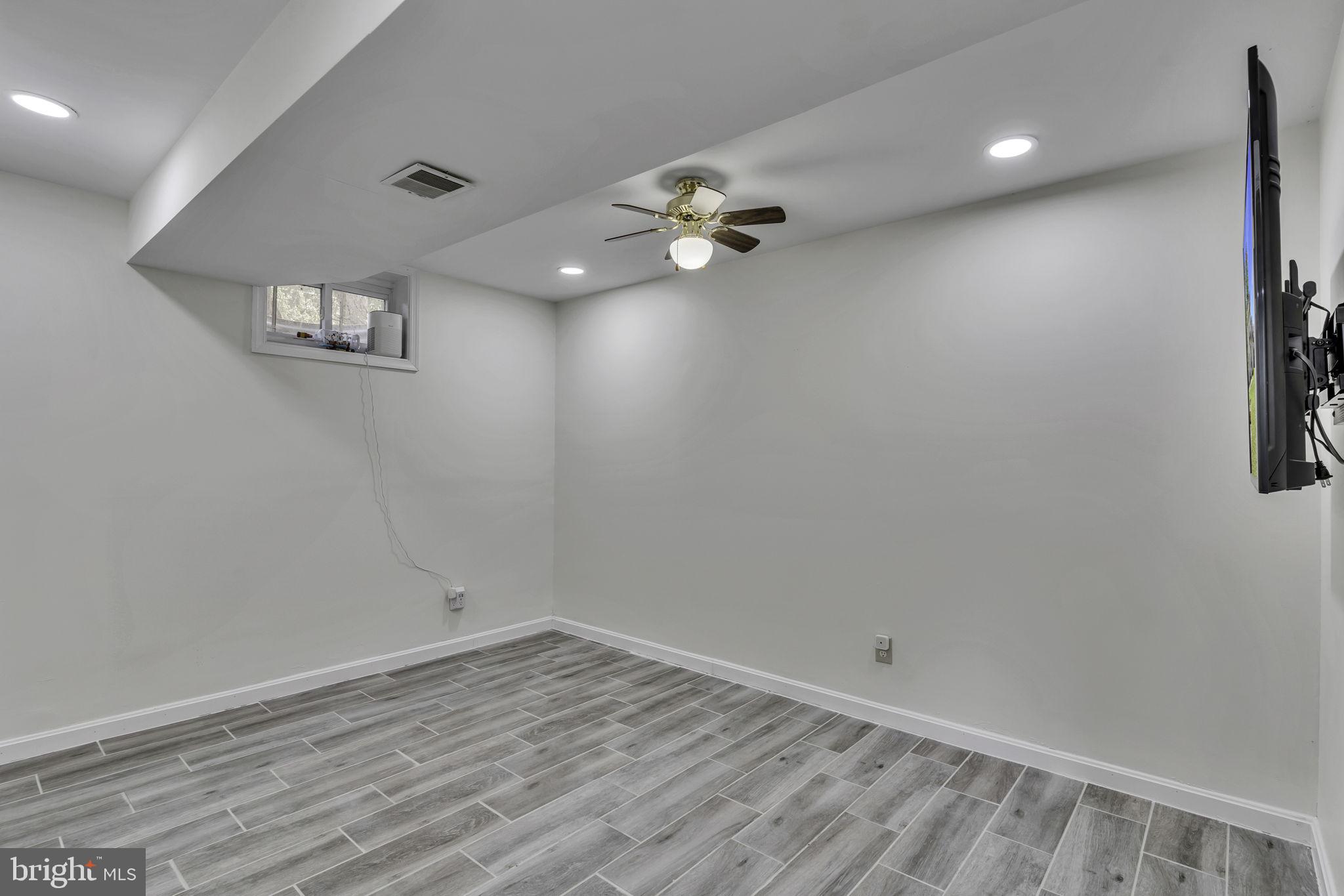 6546 Cornell Road Bryans Road, MD 20616 - Photo 29 of 35 wooden floor in an empty room