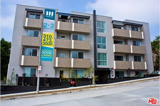a front view of a building with street