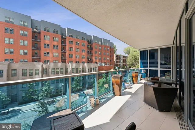 a kitchen with a table and chairs in it