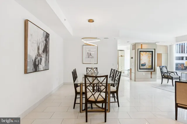 a view of a livingroom with furniture and flat screen tv