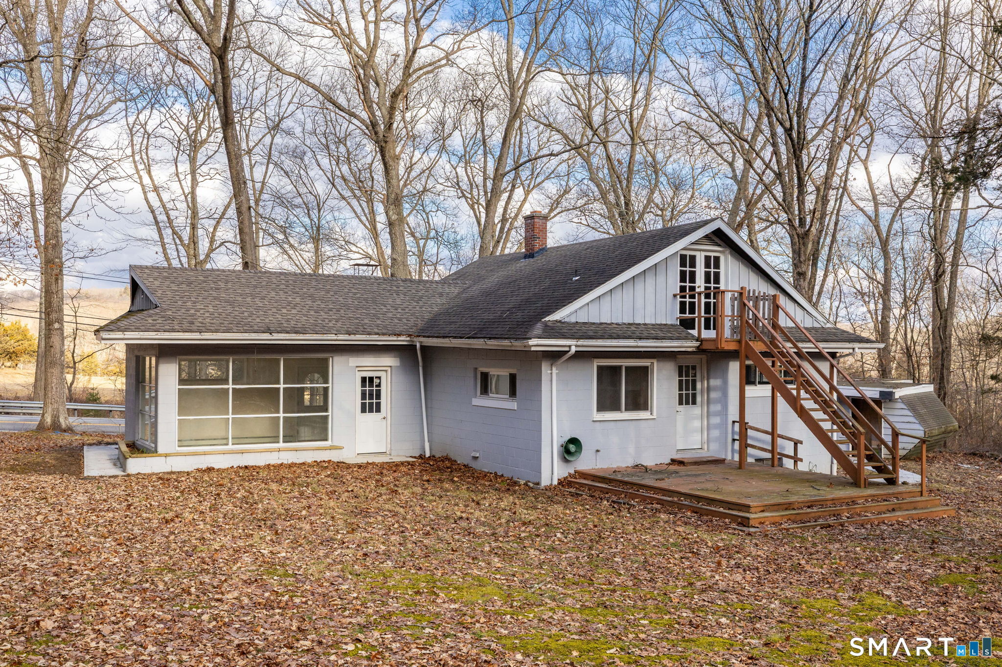 461 Pond Road Franklin, CT 06254 - Photo 30 of 35 a house with trees in the background