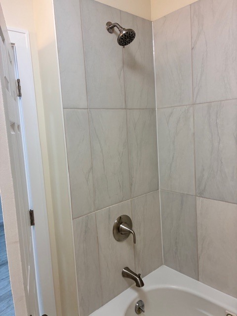 8010 South Ridgeland Avenue, Unit 1D Chicago, IL 60617 - Photo 21 of 28 a bathroom with a shower