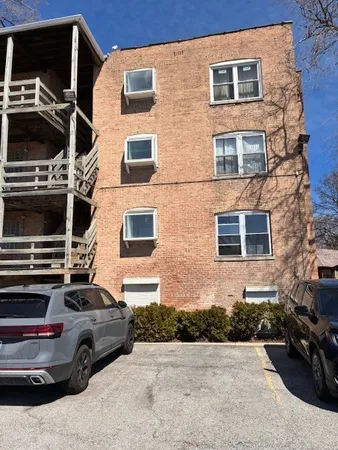a car parked in front of a building